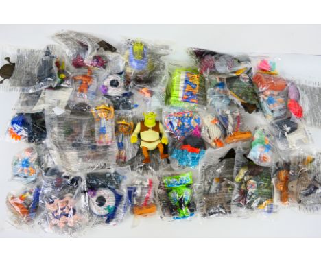 McDonalds - Fast Food Toys - A collection of predominately bagged's fast food toys from McDonalds. Lot includes toys from var