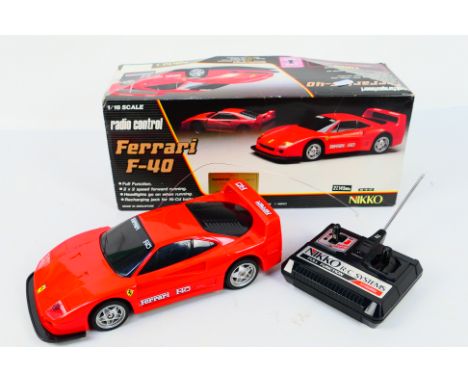 Nikko A boxed vintage 1:18 scale Nikko RDC-18150 radio control Ferrari F40. The model shows signs of light play, otherwise ap