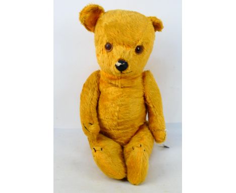 Schuco - Others - Two vintage teddy bears and a vintage toy monkey. Lot consists of a large golden teddy with jointed arms an