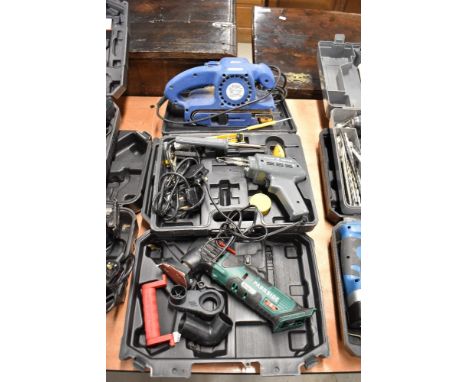 A selection of power tools including belt sander and soldering gear