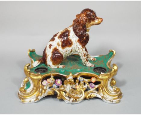 A good quality mid 19th century Jacob Petit (Fontainebleau) ceramic inkstand with applied seated brown and white spaniel in a