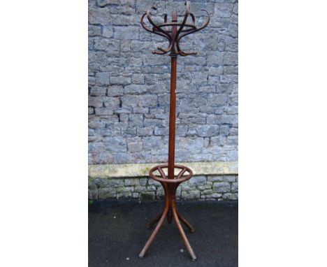 A vintage Bentwood freestanding hat and coat stand raised on swept supports