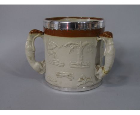 A substantial 19th century relief moulded stoneware tyg with applied sprig decoration of hounds, George and the Dragon, etc, 