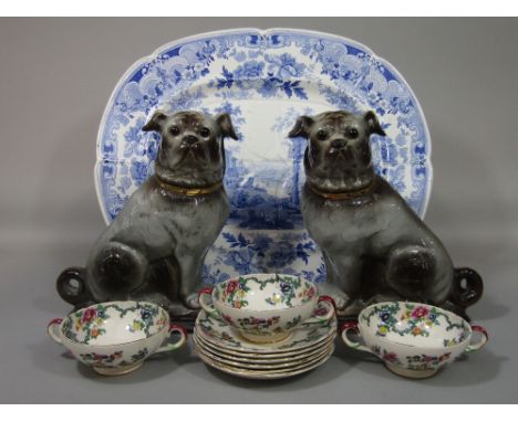 A large 19th century blue and white printed meat plate of oval form with well, with Egyptian style landscape to the centre wi