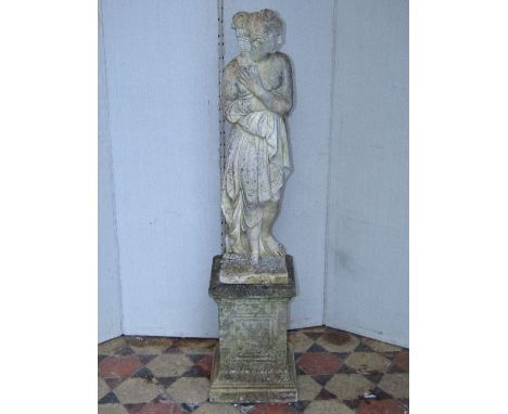 A weathered cast composition stone garden statue in the form of a classical female raised on a square pedestal, 120cm high