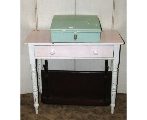 A 19th century pine side table fitted with a shallow frieze drawer raised on ring turned and tapered supports with painted fi