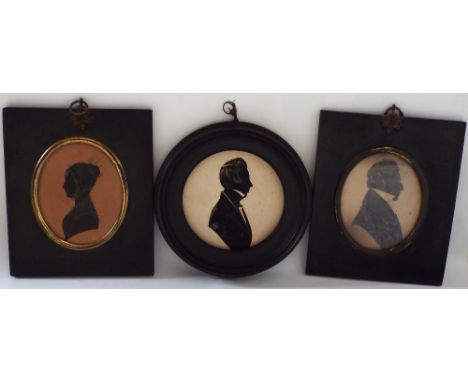 A collection of three 19th century profile silhouette portrait miniatures. comprising a young lady with shawl and gauze cap, 