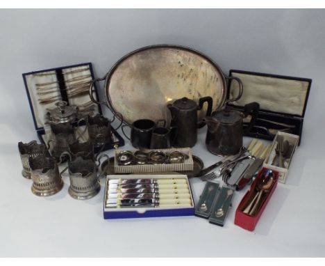 A mixed collection of silver and silver plate to include mainly silver plate items of teawares, twin handled tray, together w