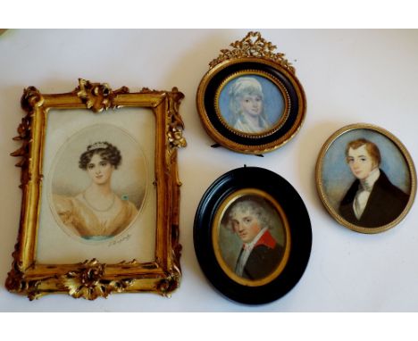 A late 18th century portrait miniature of oval form showing a gentleman in blue coat with red collar, 6cm oval approx max, to