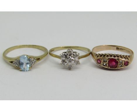 Three 9ct diamond set rings; a blue topaz cluster example, an antique ruby example (one diamond vacant) and an illusion set f