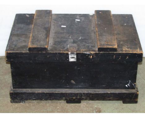 A 19th century domed topped wooden trunk with cloth skin, studded detail and side carrying handles, the paper lined interior 