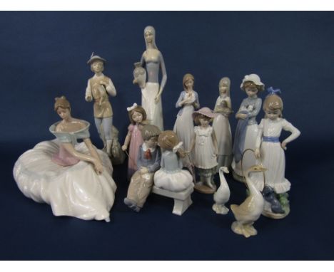 A collection of Nao and similar figures including a seated woman in voluminous skirt, 31 cm tall approx, a pair of children o