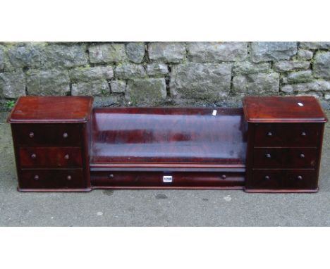 A 19th century mahogany dressing table unit of trinket drawers