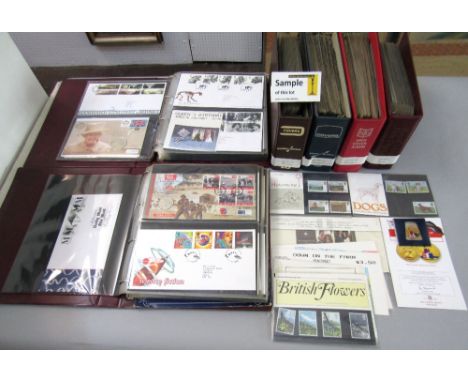 Seven albums containing a collection of Royal Mail FDCs, some with associated commemorative coins, together with a box contai