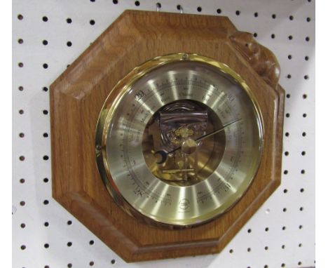 Robert Mouseman Thompson - octagonal oak wall barometer carved with a mouse with open movement, 22 cm wide