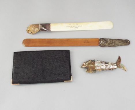 Two antique letter knives, one with otters paw mount, silver collar and ivory blade dated 1900, further Japanese letter knife