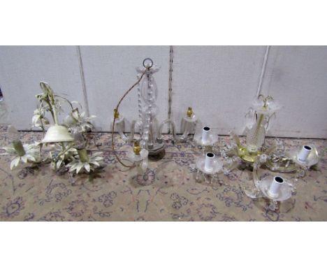 A moulded glass three branch chandelier, with faceted prism drops, one other and a light metal example with painted finish an