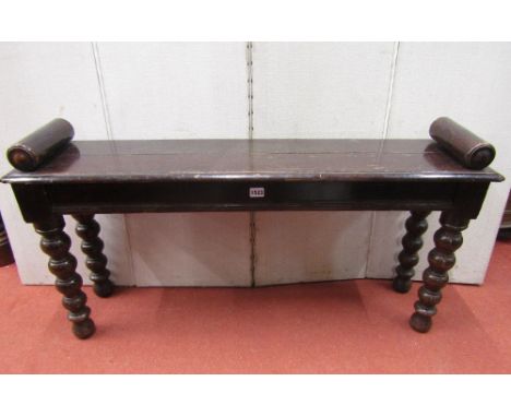 A Victorian oak window seat of rectangular form on bobbin supports, 107 cm length