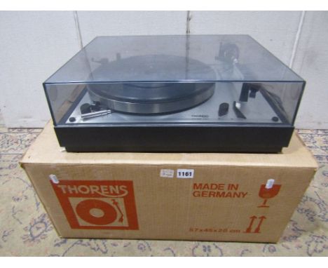 A Thorens TD166 MkII record player, with original cardboard packaging