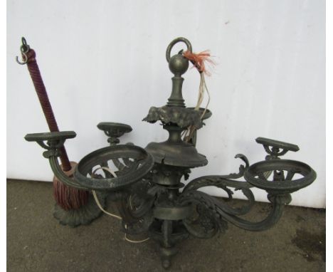 An antique cast metal six branch hanging ceiling light/electrolier, with scrolling acanthus and fruit detail, complete with c