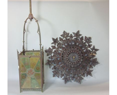 A Victorian brass framed hall lantern of square cut form with original painted leaded light panels on a floral theme, the cei