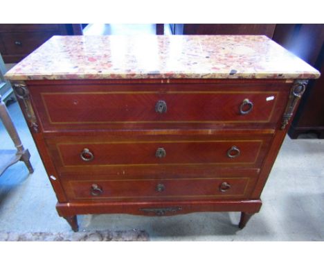 A continental Kingwood veneered commode, fitted with three long drawers, with cast gilt metal mounts and inlaid banding benea