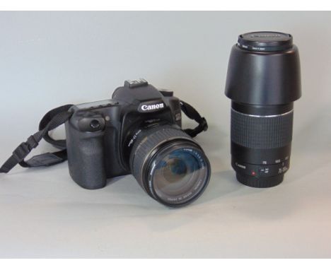 A good quality Canon EOS 40D camera with further Canon EFS17-85mm lens and another Canon 75-300mm lens and accessories (a bag