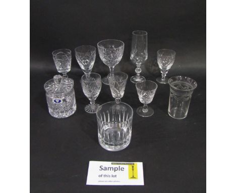 A mixed collection of cut and cranberry glassware to include various wine and sherry glasses, tumblers, novelty baskets; toge