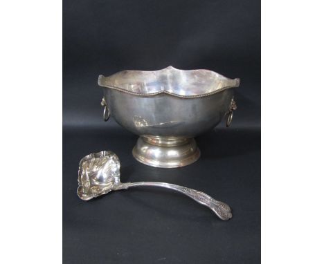 A twin handled silver plated punch bowl with gadrooned rim and twin lion head handles, upon a stepped circular base, 34cm dia