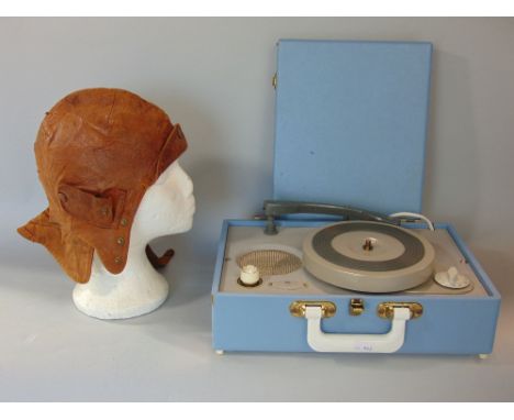 Vintage cased Kingsley portable record player in sky blue, together with a further vintage leather pilots hat (2)