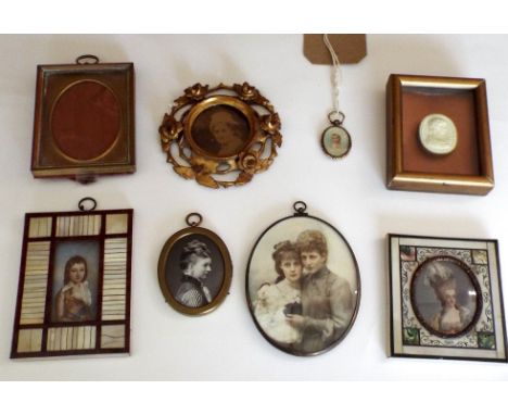 An interesting collection of 19th century and later portrait miniatures of various style including a double sided gilt metal 