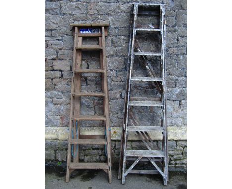 A vintage wooden folding step ladder, with seven treads, together with one other, to be sold for display purposes only (2)