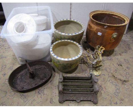 Two 19th century cast iron boot scrapers of varying design, a copper coal bin of squat cylindrical form, with lions mask and 