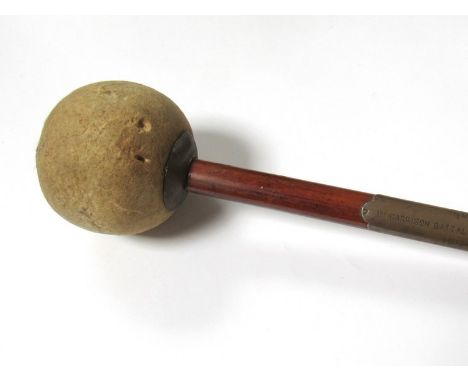 A Norfolk Regiment bass drum mallet with engraved plate "In memory of the 1st Garrison Battalion The Norfolk Regiment 1917-19