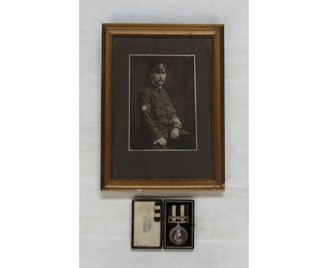 A St. John's medal with clasp to 8975 Pte. D. AUTY RAVENSTHORPE Div. No. 5 Sjab 1930 with framed portrait photograph, cased