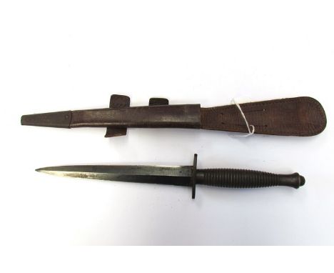 A FS type III Commando dagger with scabbard, some chipping to blade