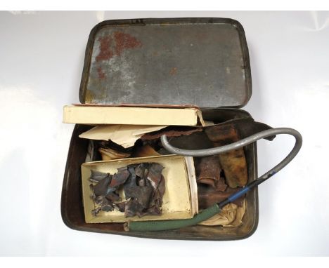 A tin of war relics collected from fields near Sandhurst Kent by R. E. Baker, a farmer at the time of the Battle of Britain 