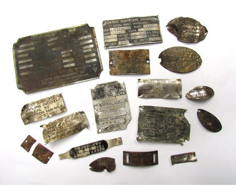 A collection of engine and parts ID tags from a US P38 lightning which crashed at Bougainville Island, Pacific. Personally ob