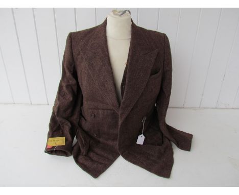 A British 1948 dated Demob suit with official paper labels, issued to RAF pilot Albert Cooper, together with gauntlets, beret