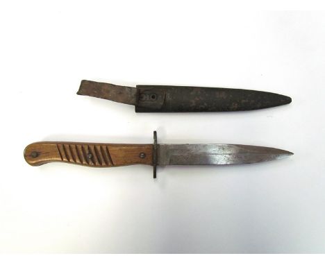 A WWI trench dagger marked ERN WALD RHEINL, with sheath