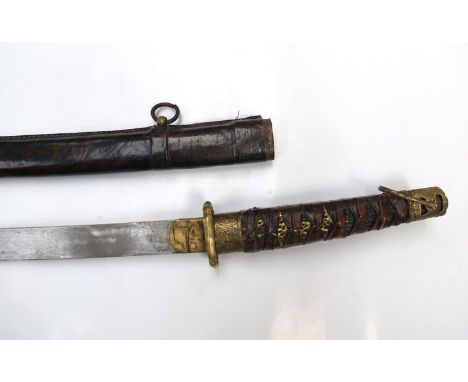 A mid 20th Century Japanese Katana style sword with leather scabbard 