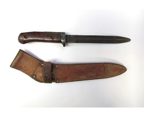 A Czech fighting knife / bayonet in leather covered scabbard