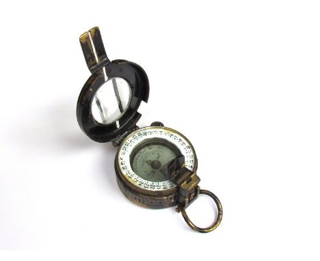 A WWII T.C Co Ltd marching compass, brass cased