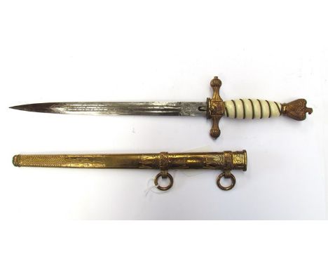 A Third Reich era German Kriegsmarine officer's dagger by W.Holler, Soingen with ivorine grip and gilt brass hilt and scabbar