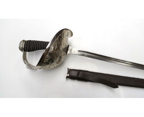 A 1912 pattern British cavalry officer's sword by Hawkes & Co, the plated steel guard with restored grip and later scabbard