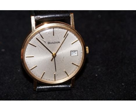 Gents Bulova vintage wristwatch 9ct gold cased. Currently ticking