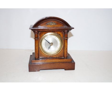 Early mantel clock with converted quartz movements