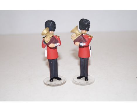 2 Corgi Scottish guard soldiers playing the tenor horn