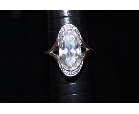 Silver dress ring with large white stone Size R