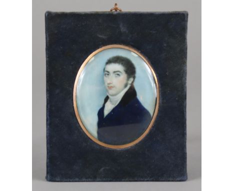 GEORGE PLACE (Irish, 1775-1809), attributed to. A portrait miniature of a gentleman, wearing navy jacket with black collar &a